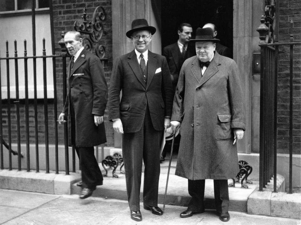 Joe Kennedy Sr. with Winston Churchill outside Downing Street, London, in 1939.