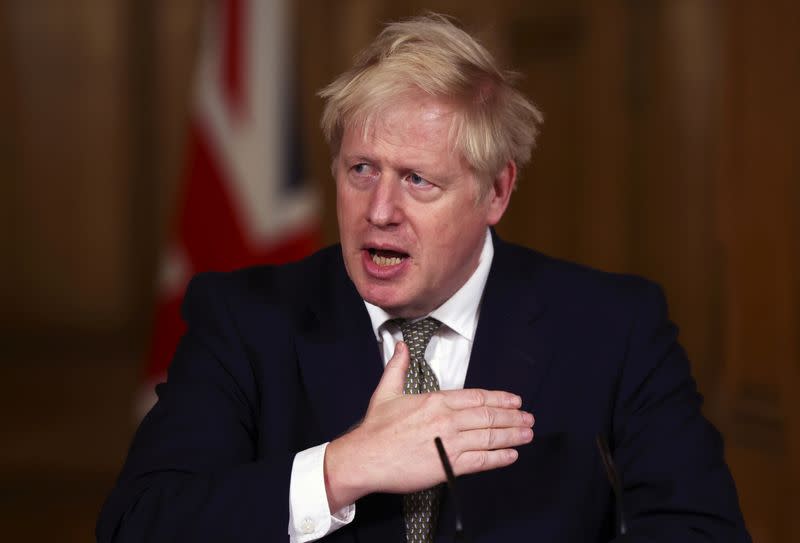 Britain's PM Johnson attends a news conference in London