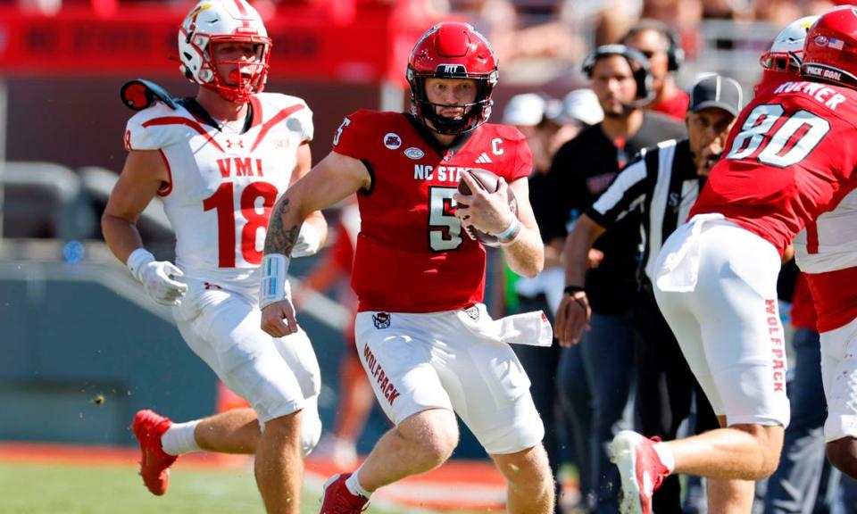 N.C. State quarterback Brennan Armstrong (5) scrambles for yards during the first half of N.C. State’s game against VMI at Carter-Finley Stadium in Raleigh, N.C., Saturday, Sept. 16, 2023.