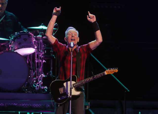 <p>John Medina/Getty </p> Bruce Springsteen performs at Footprint Center on March 19, 2024 in Phoenix.