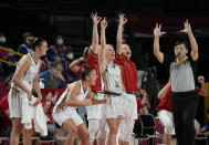 Belgium players on bench celebrate scoring by a teammate during women's basketball preliminary round game against Puerto Rico at the 2020 Summer Olympics, Friday, July 30, 2021, in Saitama, Japan. (AP Photo/Eric Gay)