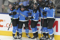 Toronto's Emma Maltais, second left, celebrates with teammates after scoring against Minnesota during the second period of Game 1 of a PWHL hockey playoffs semifinal Wednesday, May 8, 2024, in Toronto. (Chris Young/The Canadian Press via AP)