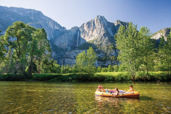 Rafting on the Merced River in Yosemite with views of Yosemite Falls