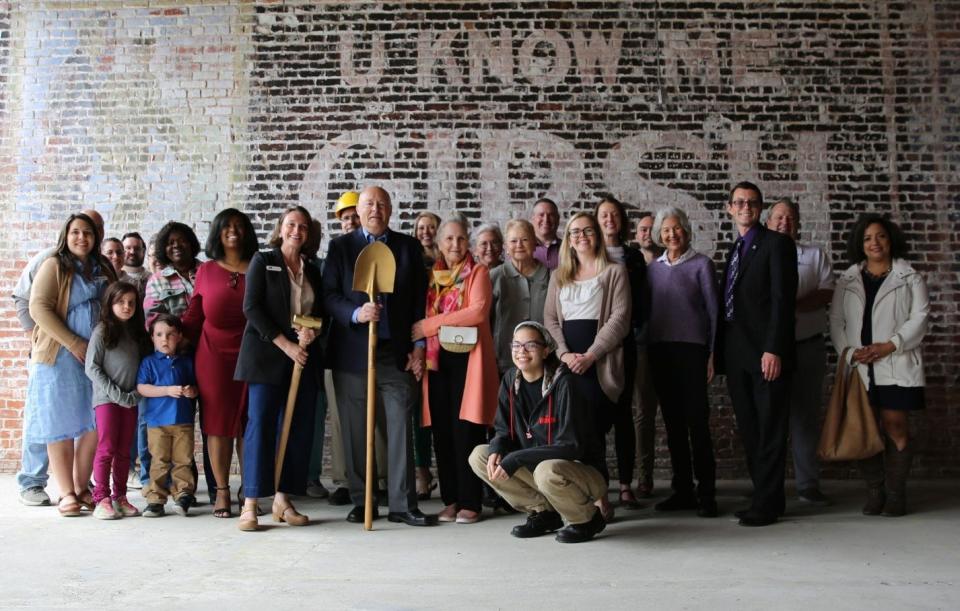 Lamb Center for Arts and Healing groundbreaking ceremony attendees strike poses in downtown Hopewell on April 2, 2024.