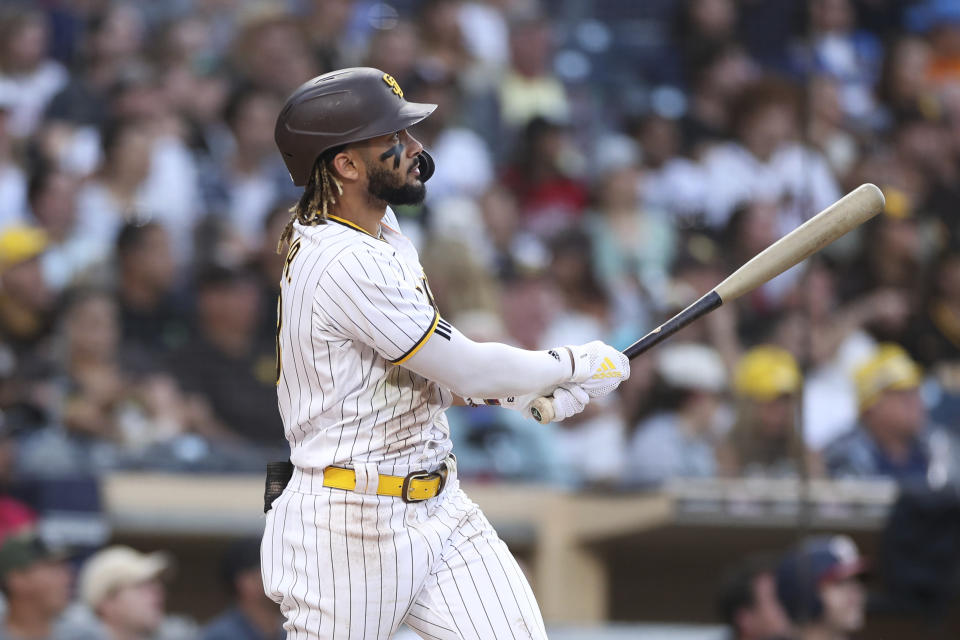 San Diego Padres' Fernando Tatis Jr. watches his solo home run off Washington Nationals starting pitcher Max Scherzer during the fourth inning of a baseball game Thursday, July 8, 2021, in San Diego. (AP Photo/Derrick Tuskan)