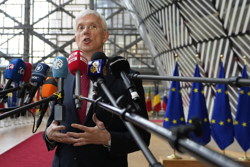 Latvia's Foreign Minister Krisjanis Karins speaks with the media as he arrives for a meeting of EU foreign ministers at the European Council building in Brussels, Monday, March 18, 2024. European Union foreign ministers on monday will discuss Russia's aggression against Ukraine, Belarus, and the situation in the Middle East. (AP Photo/Virginia Mayo)