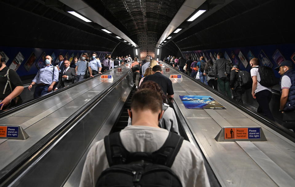 UK unemployment  Workers travel through London Bridge rail and underground station during the morning rush hour in London, Britain, September 8, 2021. REUTERS/Toby Melville