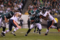 PHILADELPHIA, PA - NOVEMBER 07: LeSean McCoy #25 of the Philadelphia Eagles tries to outrun being tackled by Henry Melton #69 and Nick Reed #94 of the Chicago Bears during the first half of the game at Lincoln Financial Field on November 7, 2011 in Philadelphia, Pennsylvania. (Photo by Nick Laham/Getty Images)