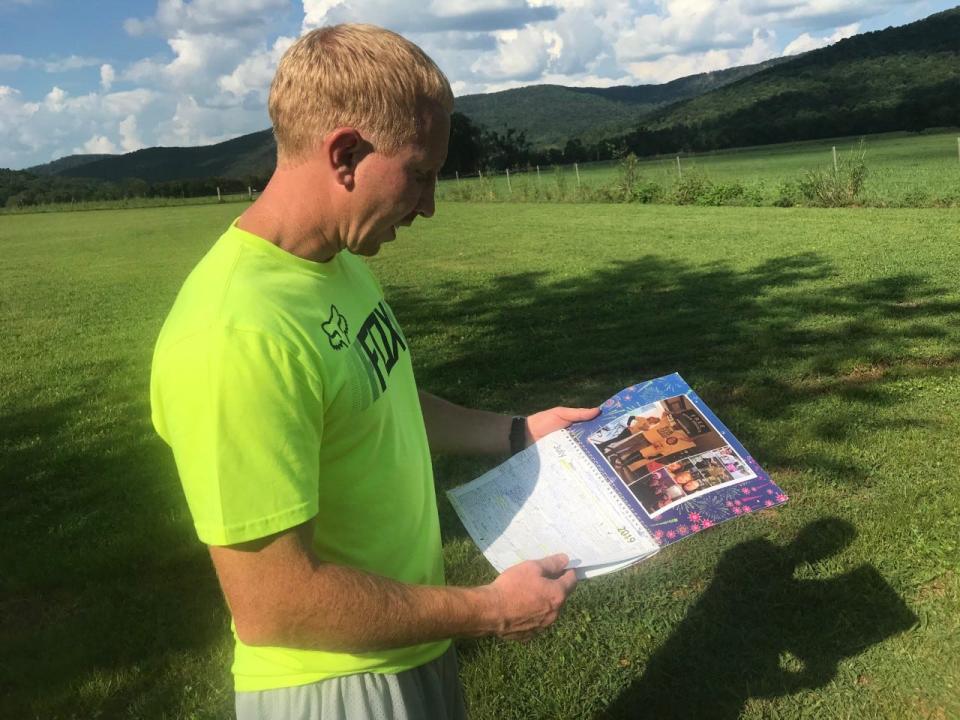 Adam Braseel looks over the calendar he kept in prison as he served 12 years for a murder he always denied. Prosecutors agreed to dismiss the murder conviction Aug. 2.