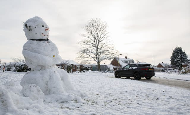 One of the advantages of the coldest night in Shawbury was it preserved this snowman (Peter Byrne/PA)