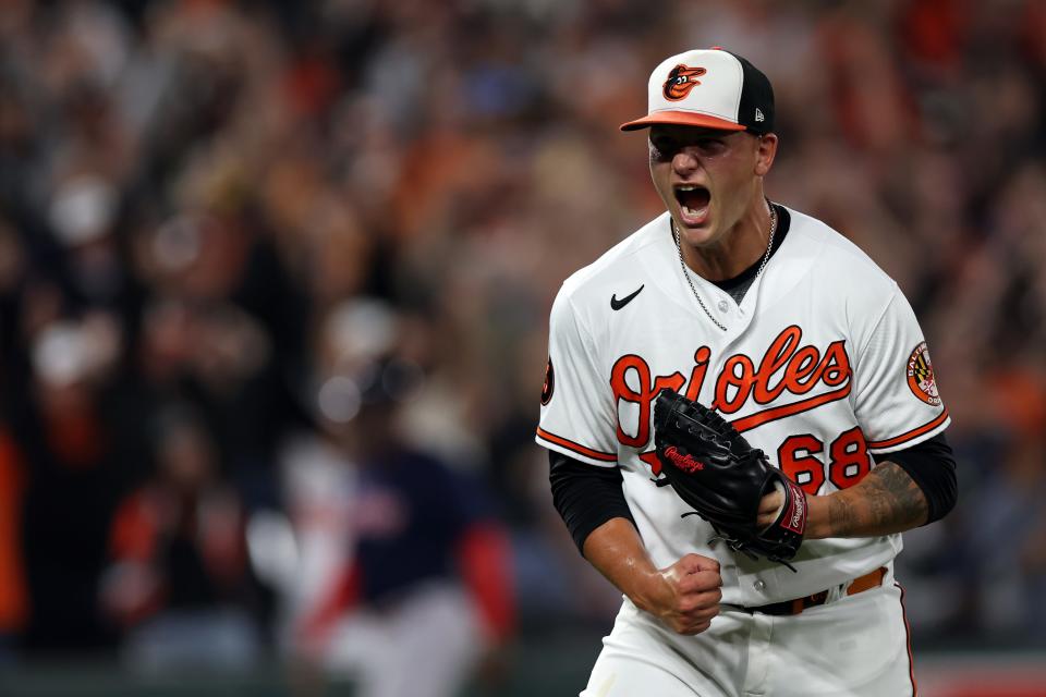 Tyler Wells celebrates after the Orioles clinched the AL East title.