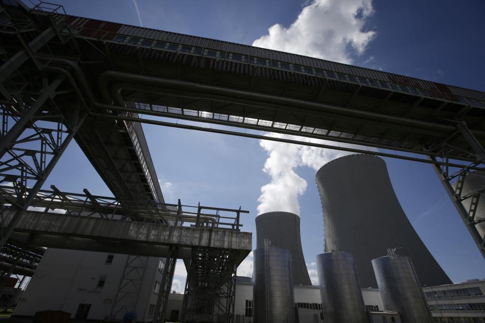 FILE - Equipment frames the cooling towers of the Temelin nuclear power plant near the town of Tyn nad Vltavou, Czech Republic, on Thursday, June 25, 2015. The U.S. and its European allies are importing vast amounts of nuclear fuel and compounds from Russia, providing Moscow with hundreds of millions of dollars in badly needed revenue as it wages war on Ukraine. (AP Photo/Petr David Josek, File)