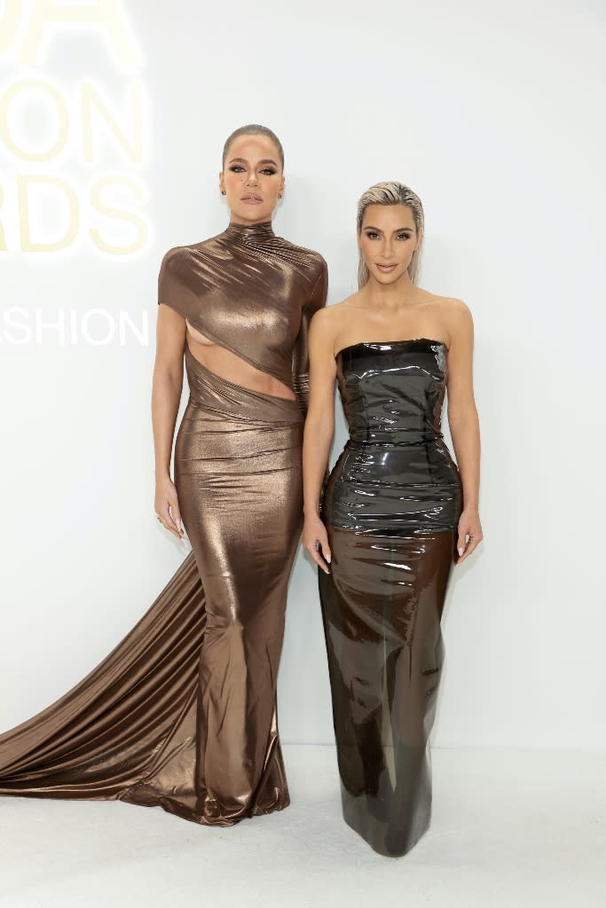 Khloe and Kim Kardashian attend the 2022 CFDA Awards at Casa Cipriani in New York City on Nov. 7, 2022. - Credit: Dimitrios Kambouris/Getty Images