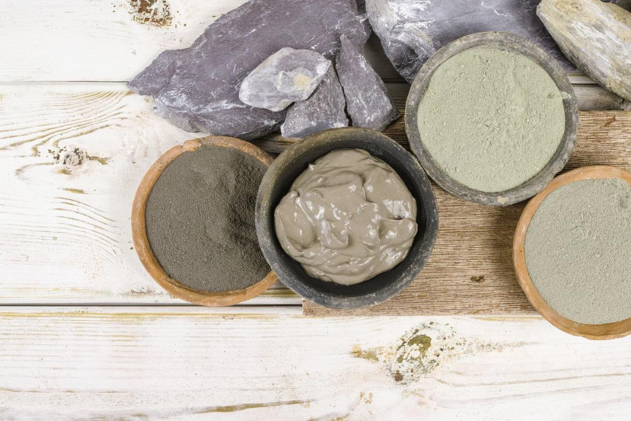 ancient minerals ochre, green, blue clay powder, mud mask