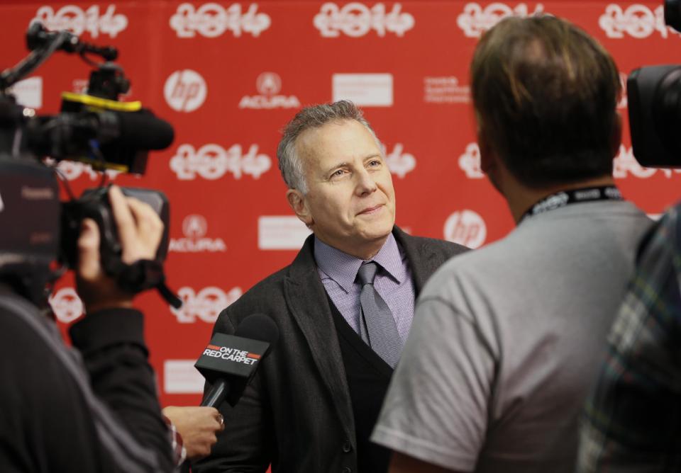 Cast member Paul Reiser is interviewed at the opening night premiere of the film "Whiplash" during the 2014 Sundance Film Festival, on Thursday, Jan. 16, 2014, in Park City, Utah. (Photo by Danny Moloshok/Invision/AP)