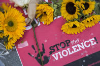 <p>Flowers are laid at a makeshift vigil for those killed in the terrorist attack on a gay night club in Orlando, on June 13, 2016 in San Francisco. The attack was the deadliest mass shooting in U.S. history. (Photo: Andrew Burton/Getty Images) </p>