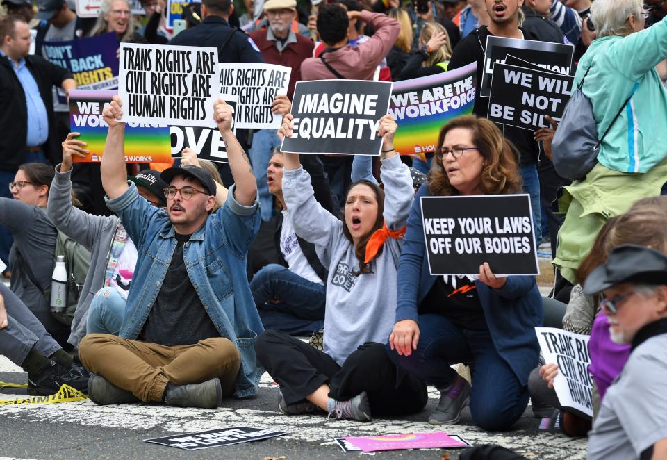 As the Supreme Court listen to arguments about sex discrimination in the workplace, protesters gather outside on Oct. 8, 2019.