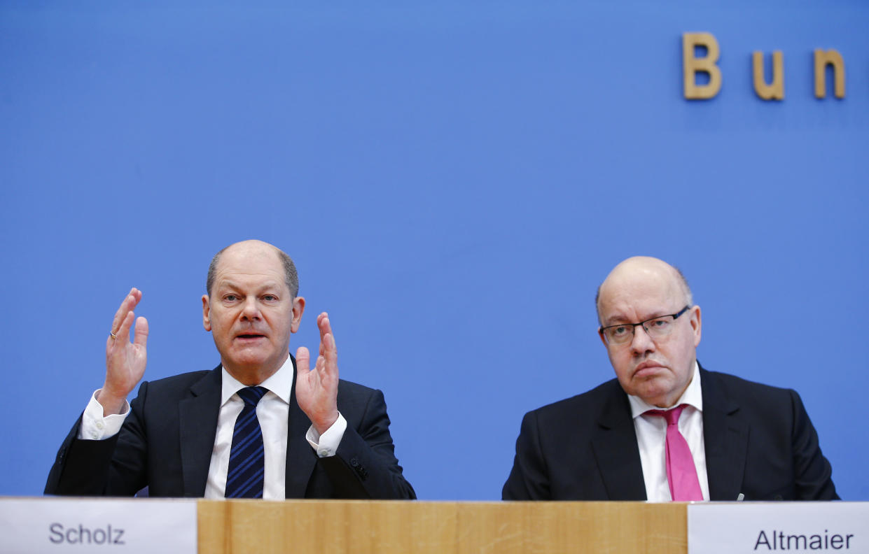 BERLIN, GERMANY - MARCH 13:  German Minister of Finance Olaf Scholz (L) and Minister of Economics and Energy Peter Altmaier (R) hold a press conference on coronavirus (Covid-19) outbreak and economic impact in Berlin, Germany on March 13,  2020. (Photo by Abdulhamid Hosbas/Anadolu Agency via Getty Images)