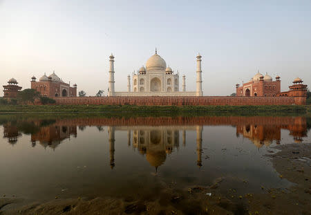 The historic Taj Mahal is pictured from across the Yamuna river in Agra, India, May 20, 2018. Picture taken May 20, 2018. REUTERS/Saumya Khandelwal