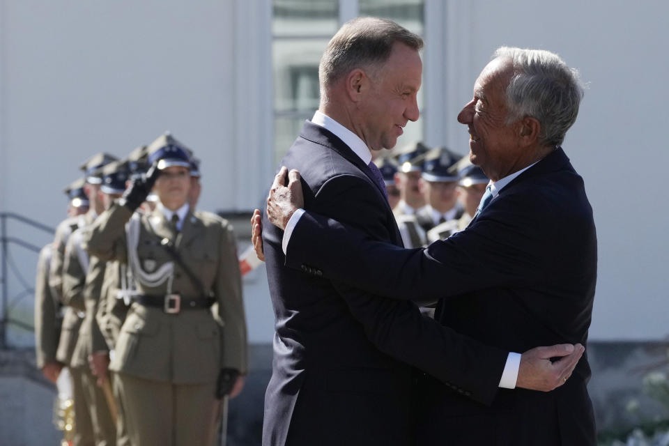 Poland's President Andrzej Duda, left, greets Portuguese President Marcelo Rebelo de Sousa during a state visit at the Belvedere Palace in Warsaw, Poland, Tuesday, Aug. 22, 2023. At a joint news conference de Sousa vowed continuing support for Ukraine's struggle against Russia's invasion, while Duda said Poland is watching Russia's transfer of some nuclear weapons into neighbouring Belarus. (AP Photo/Czarek Sokolowski)