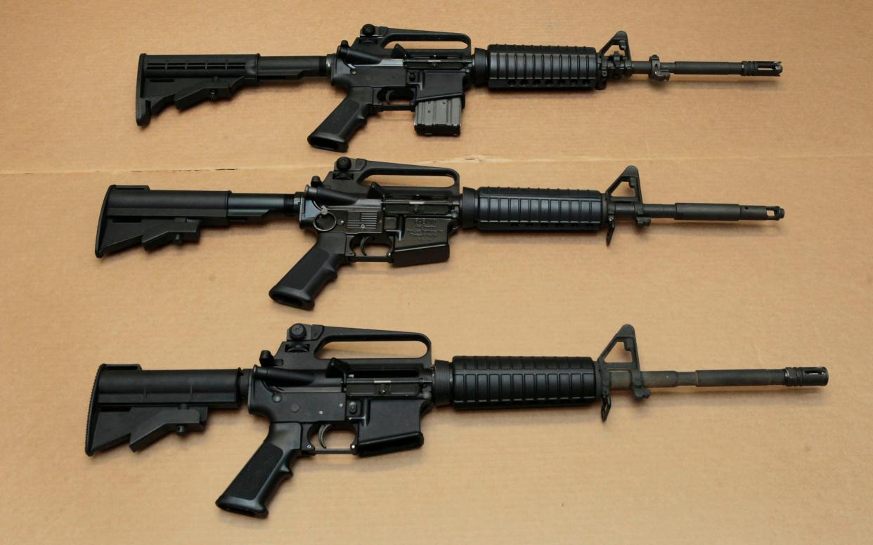 A file photo of AR-15 assault rifles similar to some of those seized in Italy.  - Associated Press