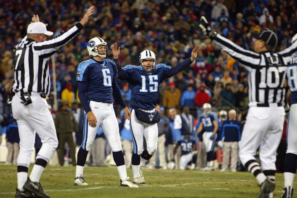 His holder and fans were celebrating, but Joe Nedney (#6) wasn't quite ready to assume his first attempt in the 2002 playoffs was good. (Jamie Squire/Getty Images)