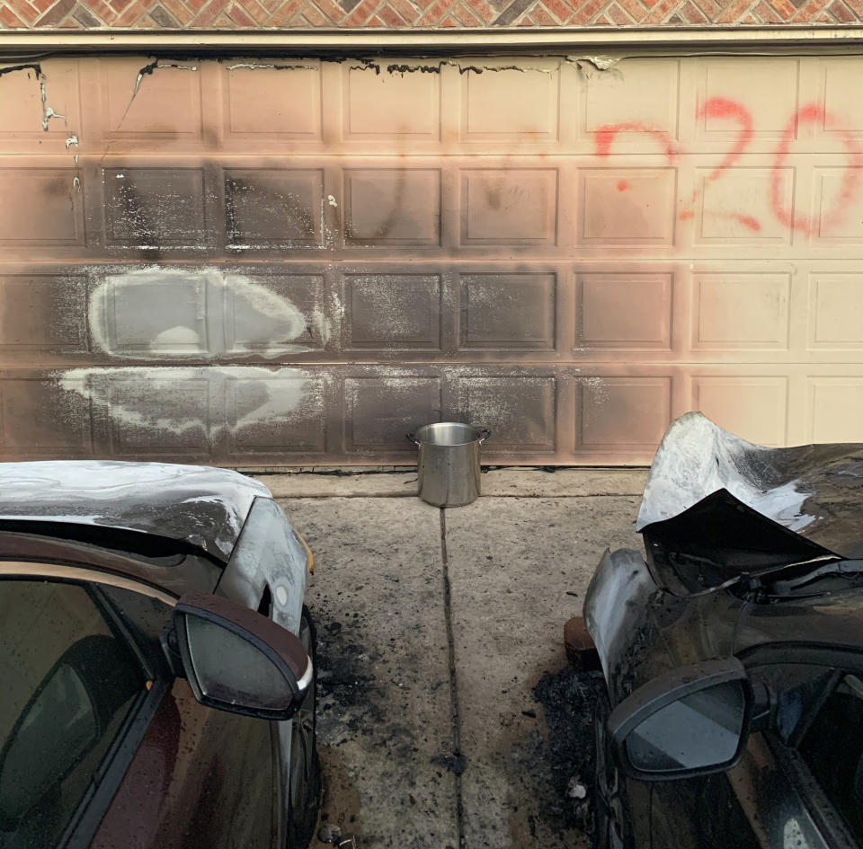 Police are investigating after two cars were set on fire and a garage door was spray-painted at the home of a Black family in Little Elm, Texas. (Jayla Gipson)