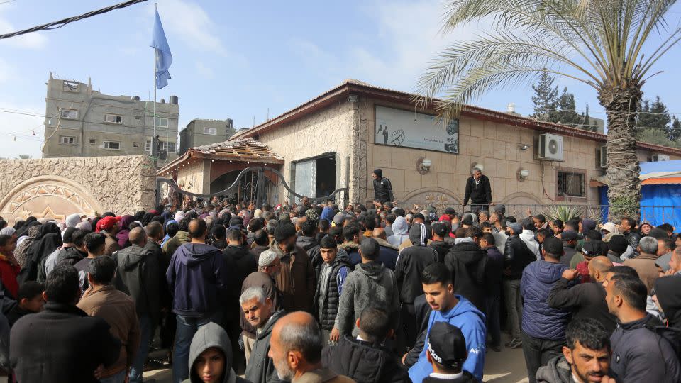 Palestinians flock to receive flour distributed by The United Nations Relief and Works Agency for Palestinian Refugees in the Near East (UNRWA) in Gaza. - Ashraf Amra/Anadolu Agency/Getty Images