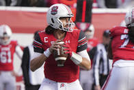 Utah quarterback Cameron Rising (7) looks to pass the ball in the first half of an NCAA college football game against Colorado, Friday, Nov. 26, 2021, in Salt Lake City. (AP Photo/George Frey)