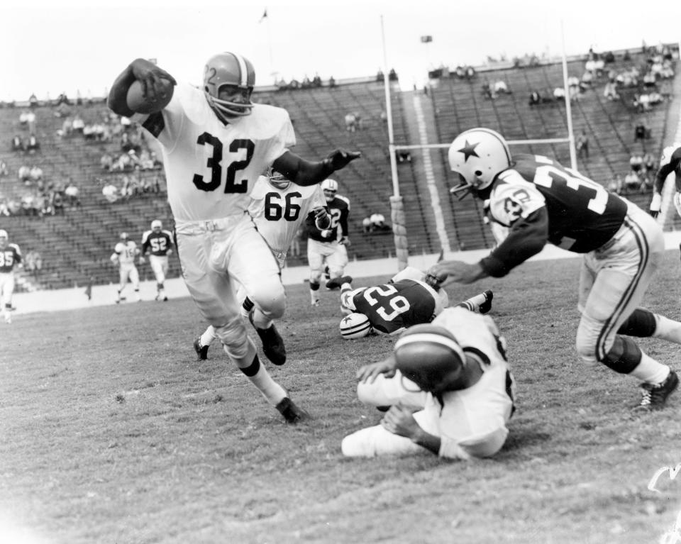 Jim Brown in action against the Dallas Cowboys in an undated photo.