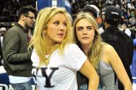 <p>Cara Delevingne and singer Ellie Goulding (left) attend the NBA Global Games London 2014 match between Atlanta Hawks and Brooklyn Nets in 2014. </p>