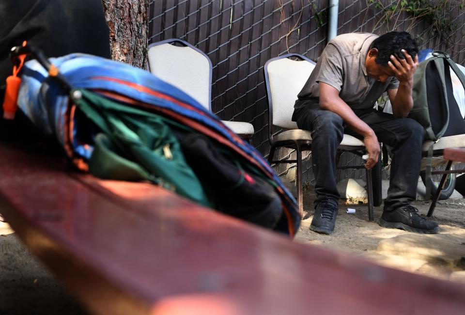 A man hangs out at Mary's Kitchen in Orange.