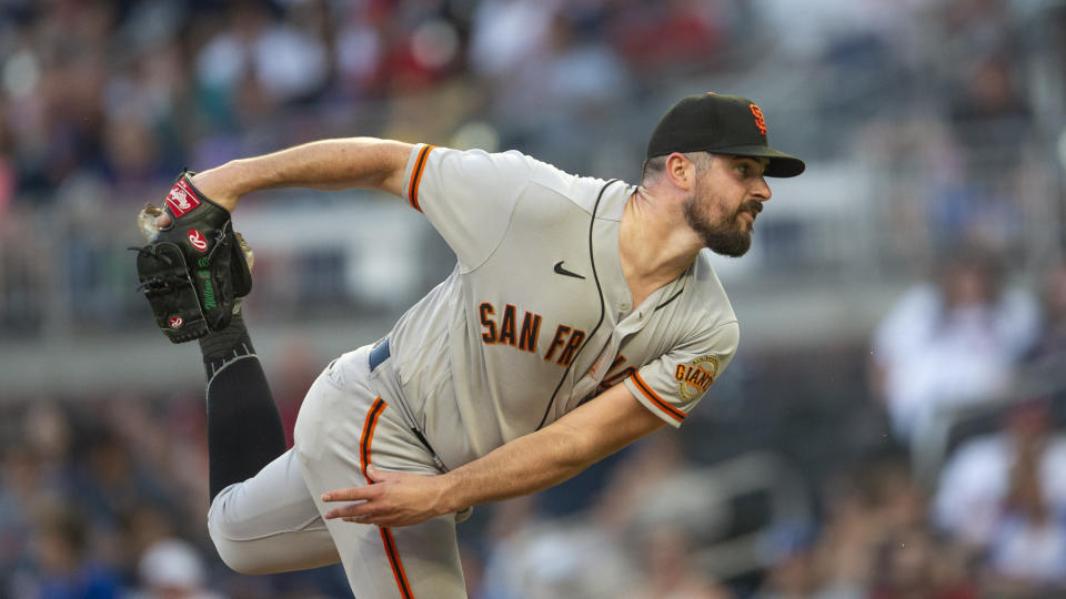 San Francisco Giants starting pitcher Carlos Rodon works against the Atlanta Braves in the fourth inning of a baseball game Wednesday, June 22 , 2022, in Atlanta. (AP Photo/Hakim Wright Sr.)