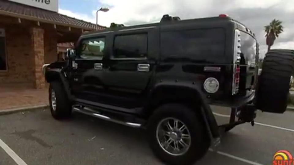 Gillian Bromley parks her 2.66-metre Hummer in two parking bays as its too big to fit in one. Photo: Sunrise