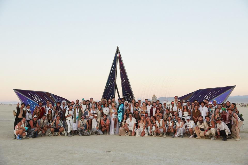 Ari and Chase with all their guests at their Burning Man wedding