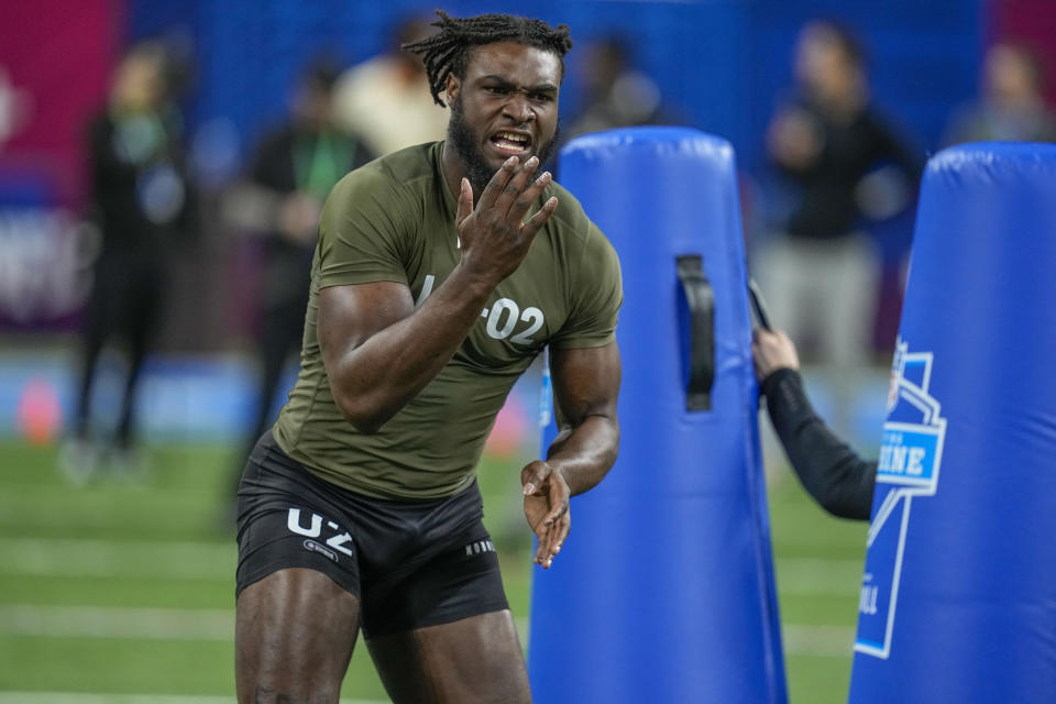 Alabama linebacker Will Anderson runs a drill at the NFL football scouting combine in Indianapolis, Thursday, March 2, 2023. (AP Photo/Darron Cummings)