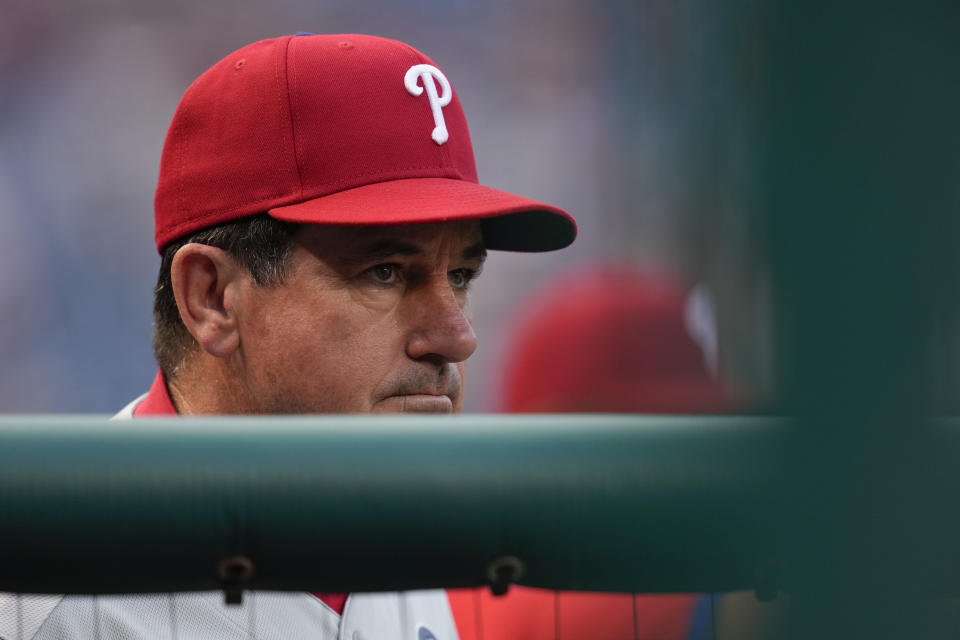 Philadelphia Phillies manager Rob Thomson stands in the dugout in the first inning of a baseball game against the Washington Nationals, Friday, June 2, 2023, in Washington. (AP Photo/Patrick Semansky)