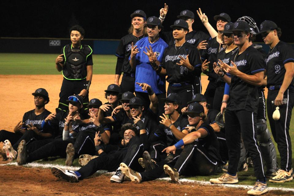 Trinity Christian players celebrate their Region 1-3A high school baseball championship against Bishop Snyder on May 14, 2024. Trinity won 8-6. [Clayton Freeman/Florida Times-Union]