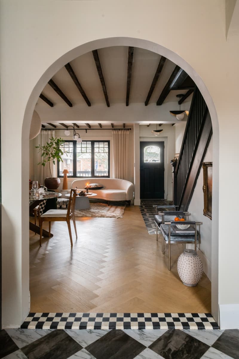 View of a living room from tile floored kitchen