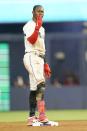 Miami Marlins' Jazz Chisholm Jr. gestures after hitting a double during the fourth inning of a baseball game against the Washington Nationals, Monday, May 16, 2022, in Miami. (AP Photo/Lynne Sladky)