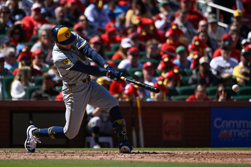 Brewers first baseman Owen Miller delivers a two-run single against the Cardinals in the seventh inning Sunday at Busch Stadium.