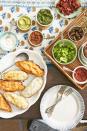 <p>Want an easy dinner everyone'll love? Roast up some sweet potatoes and then just pull out all the condiments and toppings you can muster: sour cream, mushrooms, salsa, guac, bacon, broccoli. Dinner is done!</p><p><strong><a href="https://www.countryliving.com/food-drinks/a39814615/loaded-potato-bar-recipe/" rel="nofollow noopener" target="_blank" data-ylk="slk:Get the recipe for Loaded Potato Bar;elm:context_link;itc:0;sec:content-canvas" class="link ">Get the recipe for Loaded Potato Bar</a>.</strong></p>