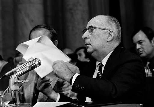 Senator Herman E. Talmadge, D-Ga., left, questions former Attorney General John Mitchell July 10, 1973 before the Senate Watergate Committee in Washington. (AP Photo)