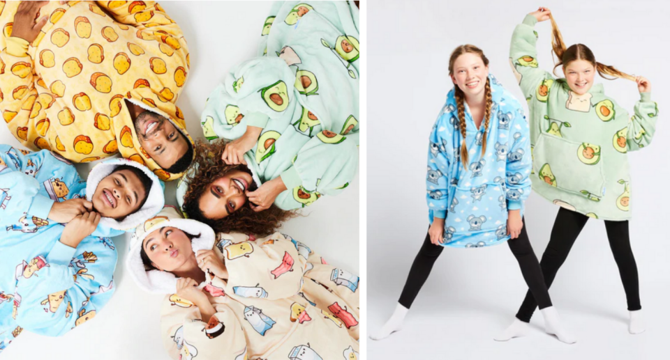At left, four people lie in a circle with their heads touching, wearing Oodie hooded suits in styles including toast, avocado and cartoon characters. At right, two girls strike poses wearing Oodie tops; the girl at left has two long plaits and wears a blue bear suit; the girl at right has pigtails and wears an avocado top. Both wear black leggings and white socks.