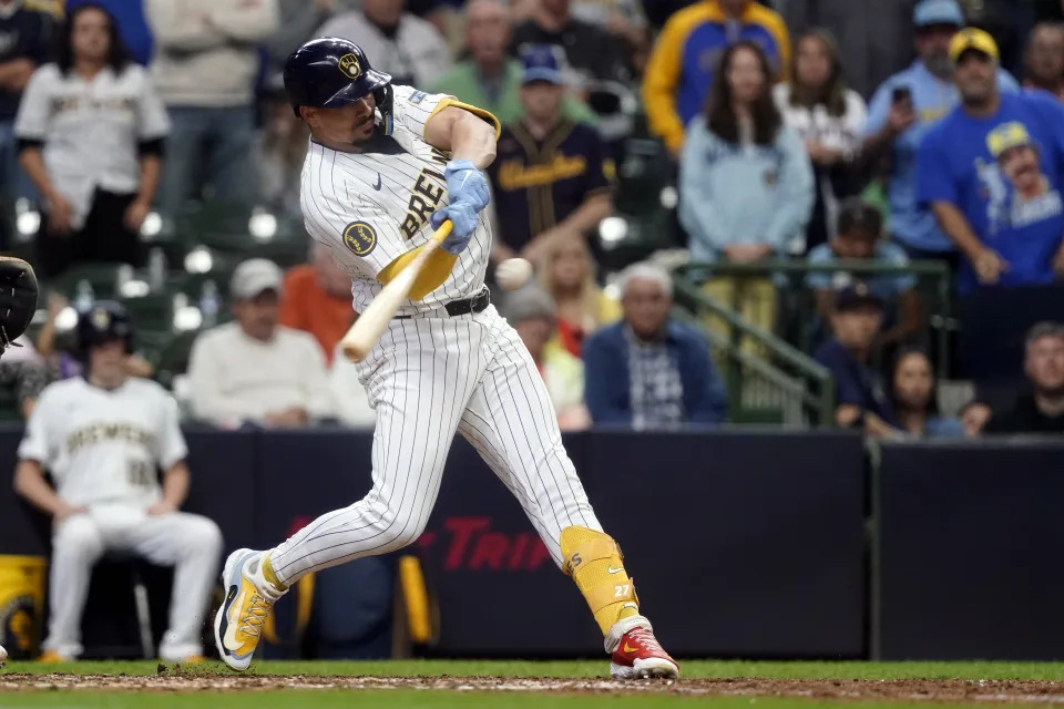 Milwaukee Brewers' Willy Adames hits a walkoff RBI single during the 10th inning of a baseball game against the Chicago White Sox, Saturday, June 1, 2024, in Milwaukee. (AP Photo/Aaron Gash)