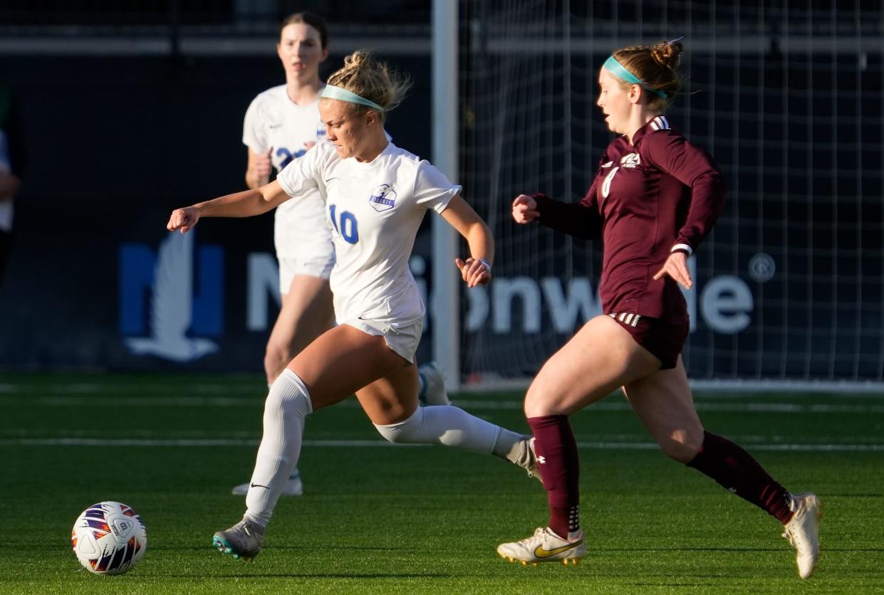 Olentangy Liberty's Chloe Brecht pushes through the Cuyahoga Falls Walsh Jesuit during the Division I state final. Brecht was named first-team all-state.