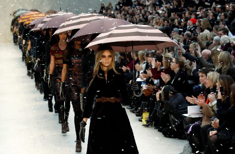 FILE PHOTO: Models present creations at the Burberry Prorsum 2012 Autumn/Winter collection show during London Fashion Week