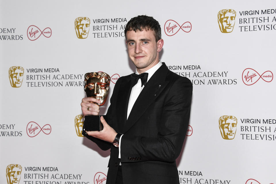 Paul Mescal poses for photographers with his Leading Actor award for his role in 'Normal People' backstage at the British Academy Television Awards in London, Sunday, June 6, 2021. (AP Photo/Alberto Pezzali)