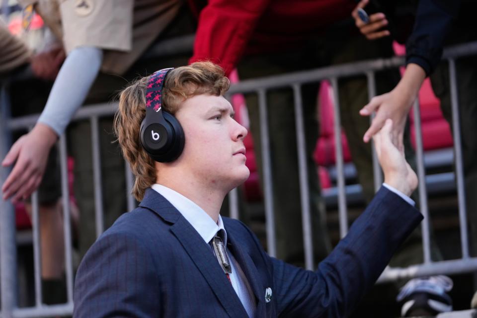 Nov 18, 2023; Columbus, Ohio, USA; Ohio State Buckeyes quarterback Devin Brown walks into Ohio Stadium prior to the NCAA football game against the Minnesota Golden Gophers.