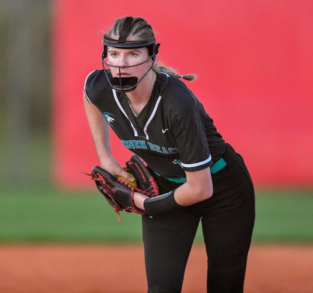 Jensen Beach’s Mallory Wheeler (16) gets ready to pitch in a high school softball game against Centennial, Wednesday, Feb. 21, 2024, in Port St. Lucie.